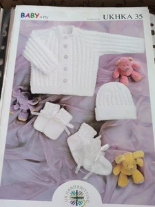 UKHKA Baby jacket, Hat, Mittens & Bootees 4 Ply Knitting Pattern - Picture 1 of 3
