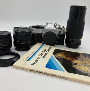 Canon AE-1 Camera Set With Strap Lenses 28mm, 50mm, & 200mm - Picture 1 of 9