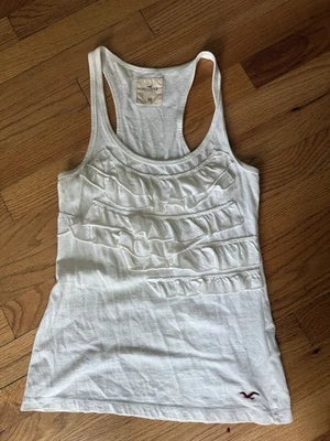 Camisa Hollister para mujer talla XS marfil camiseta sin mangas con volantes Foto 1 de 4