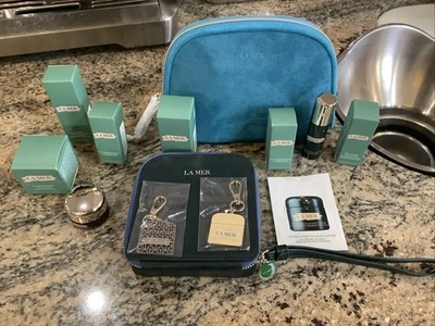 La Mer Blue Suede Pouche Navy Pouche Filled with Products New And Bag  Charms - Image 1 of 4