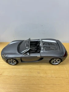 Maisto Porsche Carrera GT 1/18 Silver Premium Diecast Model Car Pre-owned - Picture 1 of 8