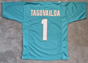TUA TAGOVAILOA UNSIGNED CUSTOM PRO STYLE XL MIAMI DOLPHINS TEAL JERSEY - Picture 1 of 2