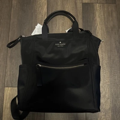 MOCHILA CONVERTIBLE KATE SPADE CHELSEA NYLON NEGRA CREMALLERA SUPERIOR MEDIANA GRANDE DORADA Foto 1 de 4