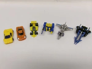 Menge 6 TRANSFORMATOREN MINI-CONS....MIRAGE...ZÜNDKERZE...TERRADIV...& MEHR - Bild 1 von 7