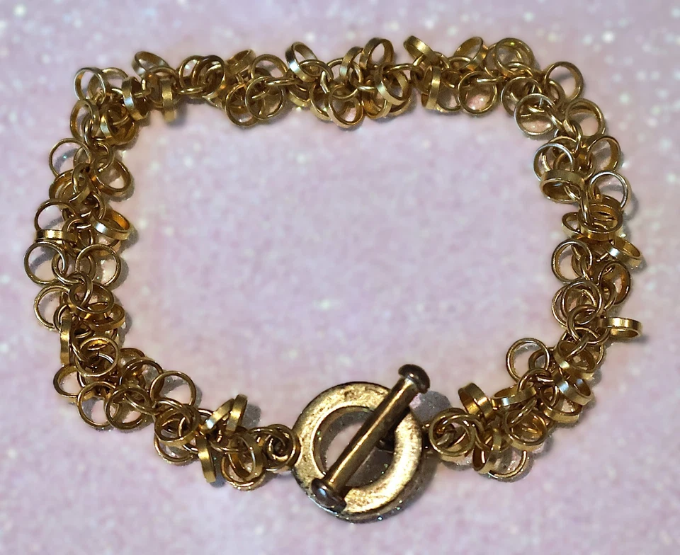 Pulsera Cha Cha tono dorado mate Carolee cierre de palanca 7,5" B186 Foto 1 de 2