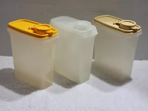 3 VINTAGE TUPPERWARE JUNIOR CEREAL STORE & POUR #499 SHEER W/ORANGE & GOLD LIDS - Picture 1 of 4