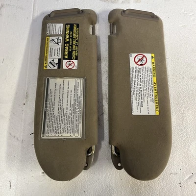 Juego de parasol izquierdo y derecho Toyota Tacoma 1995-2004 OEM marrón  Foto 1 de 4