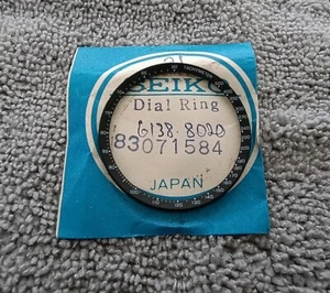 ANILLO ESFERA ORIGINAL NUEVO DE LOTE PARA SEIKO PANDA 6138-8020 (N.º DE PIEZAS 83071584) - Imagen 1 de 5