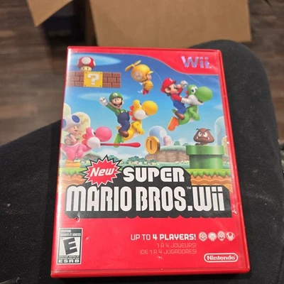 New Super Mario Bros. Wii (Nintendo Wii, 2009) Complete with Manual CIB Tested - image 1 of 4