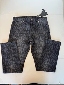 Versace Black Logo-Print Allover straight-leg jeans - Picture 1 of 8