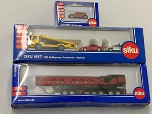 Remolque Siku 1:87 1838, 1872 Mini Cooper y una grúa móvil en embalaje original - Imagen 1 de 2