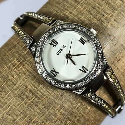 Reloj analógico de cuarzo Guess para dama G85970L tono plata bisel cristal esfera blanca 6" Foto 1 de 4