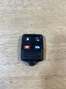 ORIGINAL FORD 98-05 OEM KEY LESS ENTRY REMOTE TRANSMITTER ALARM FOB 4-BUTTON USA - Picture 1 of 2