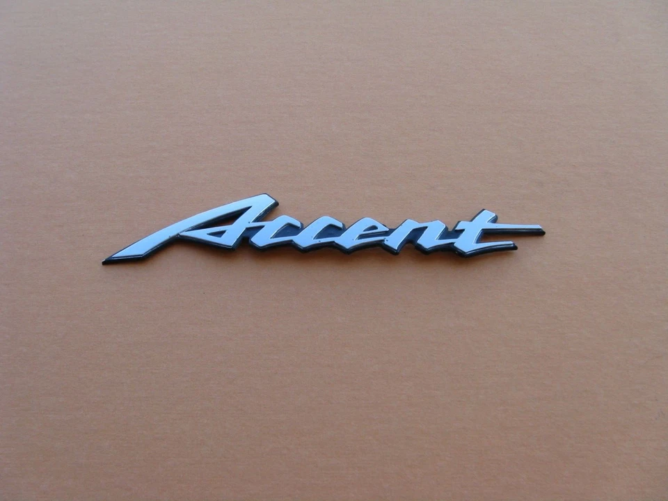 03 04 05 HYUNDAI ACCENT REAR LID CHROME EMBLEM LOGO BADGE SIGN SYMBOL OEM A44981 - Image 1 of 4