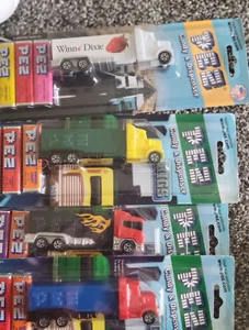 4 truck PEZ DISPENSERS witn candy - Picture 1 of 1