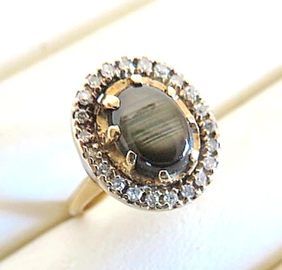Anillo vintage Estate de oro amarillo de 14 quilates con halo de diamantes y zafiro estrella negra talla grande Foto 1 de 4