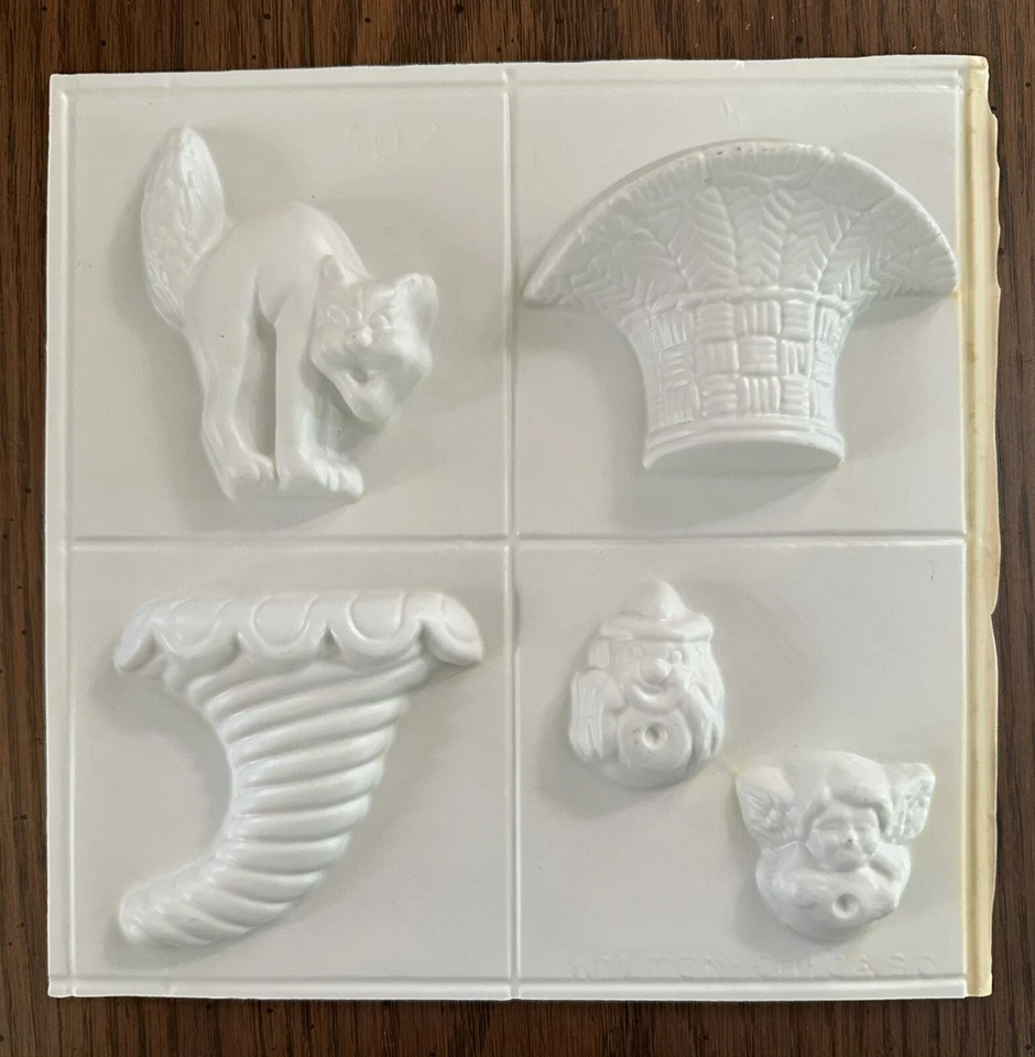 Moldes de caramelo Wilton de vacaciones de otoño gato, cesta, cuerno de la abundancia, ángel, espantapájaros de colección Foto 1 de 1