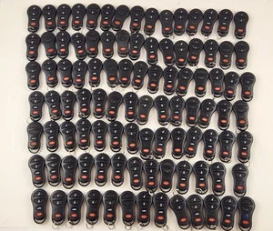ORIGINAL LOT OF 100 DODGE JEEP CHRYSLER 98-09 FOB KEY LESS REMOTE ALARM OEM BULK - Picture 1 of 13