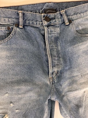 Джинсы из искусственно состаренной джинсовой ткани John Elliot синие размер 34x26 - Изображение 1 из 4