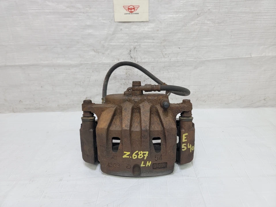 Pinza de freno delantera izquierda Lexus RX450h 2010-2015 OEM 47750-0E031 Foto 1 de 4