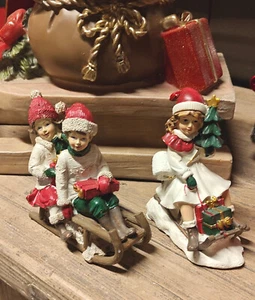 Clayre&Eef Winterkinder Junge/Mädchen  mit Schlitten Figur 13 cm Weihnachtsdeko - Bild 1 von 9