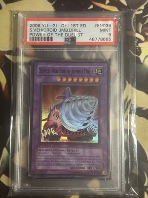 Yugioh: Super Vehicroid Jumbo Drill - POTD-EN036 - Super Rare 1st Edition PSA 9 - Image 1 of 2