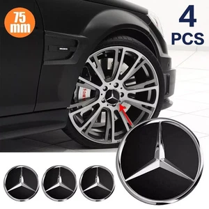 TAPPI COPRIMOZZO PER MERCEDES 75 MM NERO CERCHI RUOTE CLASSE A B C E COMPATIBILE - Foto 1 di 2