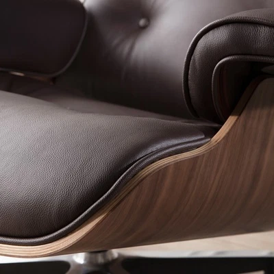 Sillón y otomana Taller Mid Century de cuero italiano genuino giratorio Foto 1 de 4