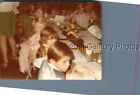 FOUND COLOR PHOTO J+3740 BOYS SITTING AT TABLE FOOTBALL PLAYER FIGURINE ON TABLE