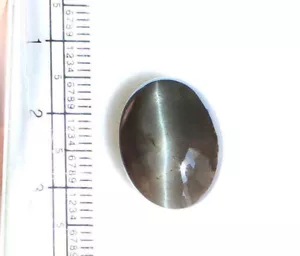Lote de piedras preciosas sueltas color oscuro natural ojo de gato escapolita de 14,40 quilates 1 pieza - Imagen 1 de 5