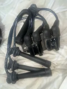 2001 KIA RIO COIL PACK AND WIRES - Picture 1 of 4