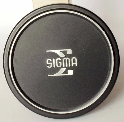 Sigma 65mm metal push on front cap to fit 62mm filter threads. - Image 1 of 2