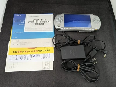 B764 Sony PSP 2000 console Ice Silver Handheld system Japan w/adapter memory - Image 1 of 4