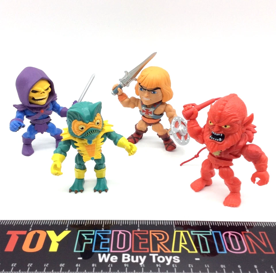 Mattel The Loyal Subjects Vinilo Maestros del Universo He-Man Lote de 4 Figuras Foto 1 de 4