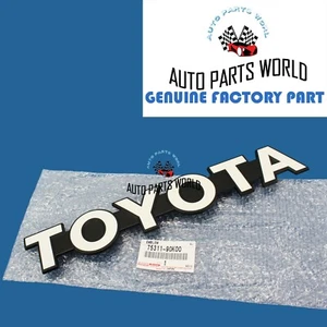 GENUINO FABRICANTE DE EQUIPOS ORIGINALES TOYOTA 85-87 LAND CRUISER BJ70 PARRILLA DELANTERA PANEL EMBLEMA 75311-90K00 - Imagen 1 de 3