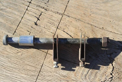 1974 Kawasaki KZ400 REAR AXLE w/ CHAIN TENSIONERS, SPACER, NUT OEM - Image 1 of 3