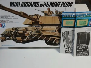 Tamiya (35158): M1A1 Abrams with mine plow + update au 1:35 - Photo 1/7
