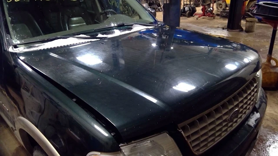 *LOCAL PICKUP ONLY* Green Hood 4 Door Excluding Sport Trac Fits 02-05 EXPLORER - Image 1 of 4