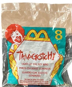 McDonald’s Happy Meal Spielzeug Tamagotchi beleuchtet Schlüsselanhänger #8 versiegelt 1998 Vintage - Bild 1 von 7