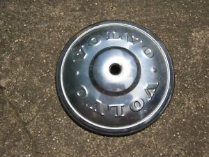 One factory 1972 Volvo bolt on center cap hubcap