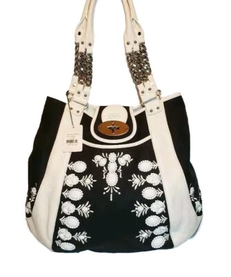 BOLSO DE HOMBRO LOCKHEART GWEN DE LONA Y APLIQUES DE CUERO CON JOYAS COMO NUEVO CON ETIQUETAS $625 Foto 1 de 4