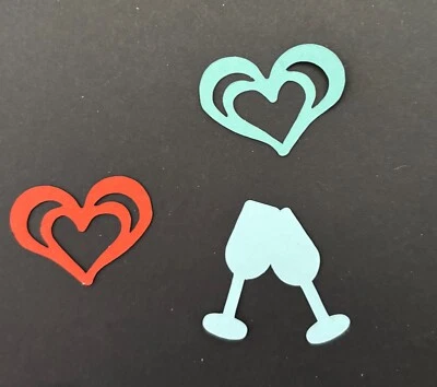 Confeti de cartulina hecho a mano -- corazones, árboles, copos de nieve y vasos  Foto 1 de 4