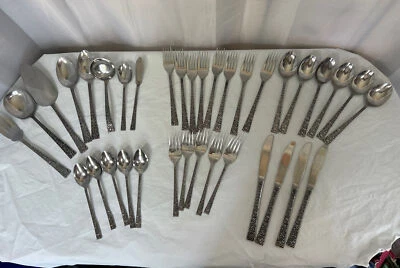 Japan Raised Floral Repousse Stainless 36 PCs Includes 4/5 Pc Set Plus & Serving - Image 1 of 4