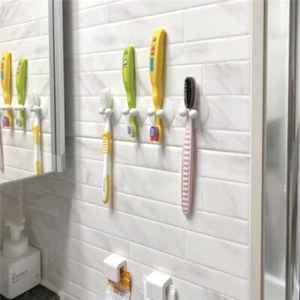 Soporte para cepillo de dientes, ventosa montada en pared accesorios de baño sin perforar - Imagen 1 de 7