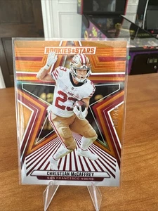 Panini Rookies & Stars 2024 - Christian McCaffrey #85 naranja/249 - Imagen 1 de 2