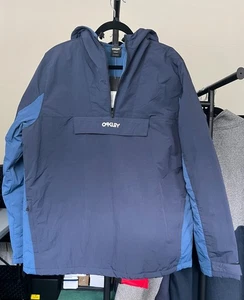 Chaqueta Oakley para hombre color bloque anorak azul braza talla X-grande, nueva con etiquetas - Imagen 1 de 11