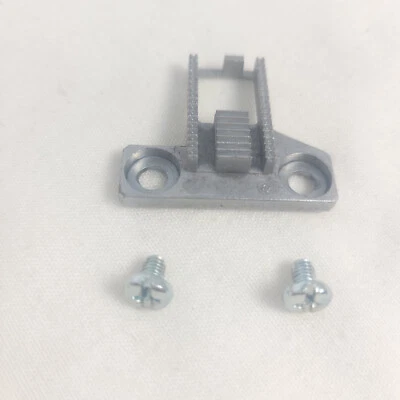 Kenmore Model 385.19106900 Sewing Machine Part Feed Dog with Screws - Image 1 of 3