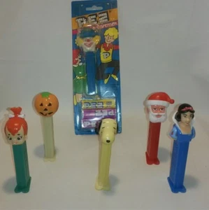 ☆ LOT OF 6 PEZ DISPENSERS -SNOOPY ,PEBBLES , CLOWN, SANTA CLAUS,SNOW WHITE ETC. - Picture 1 of 11