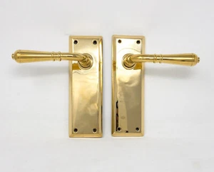 EMTEK 8054TUS7 7-1/8" Quincy Sideplate Brass Dummy Set w/Turino Lever Polished B - Picture 1 of 2