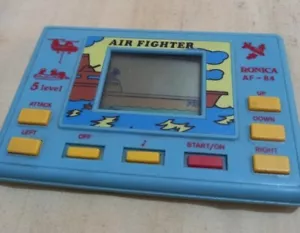 Ronica Af-84 Air Fighter scacciapensieri handheld LCD game Vintage Tested Works - Picture 1 of 3